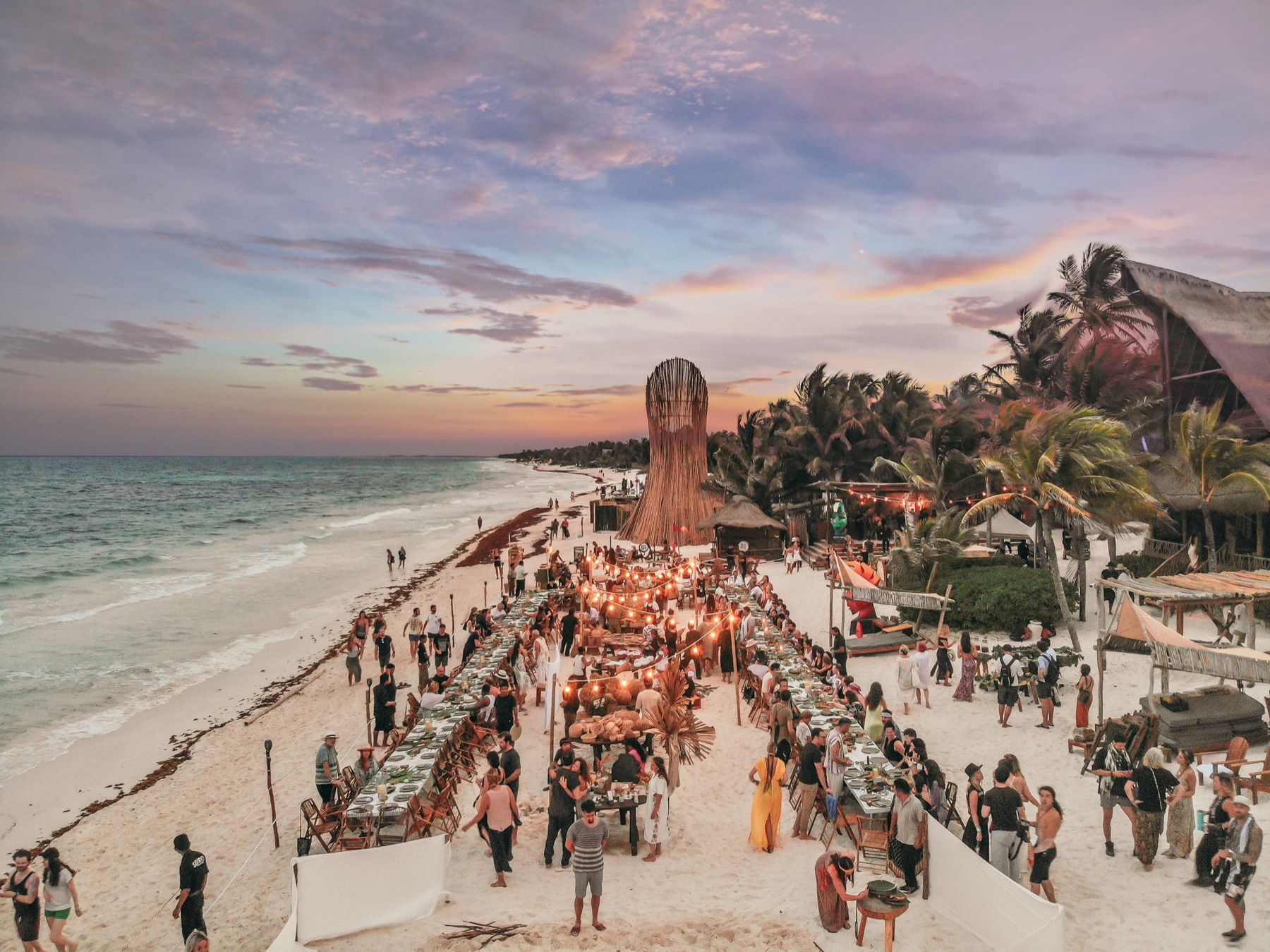 Beachfront dinner at Ahau Tulum at sunset